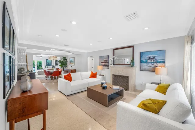 a living room with furniture and a table