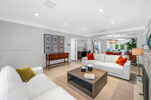 a living room with furniture or couch and a wooden floor