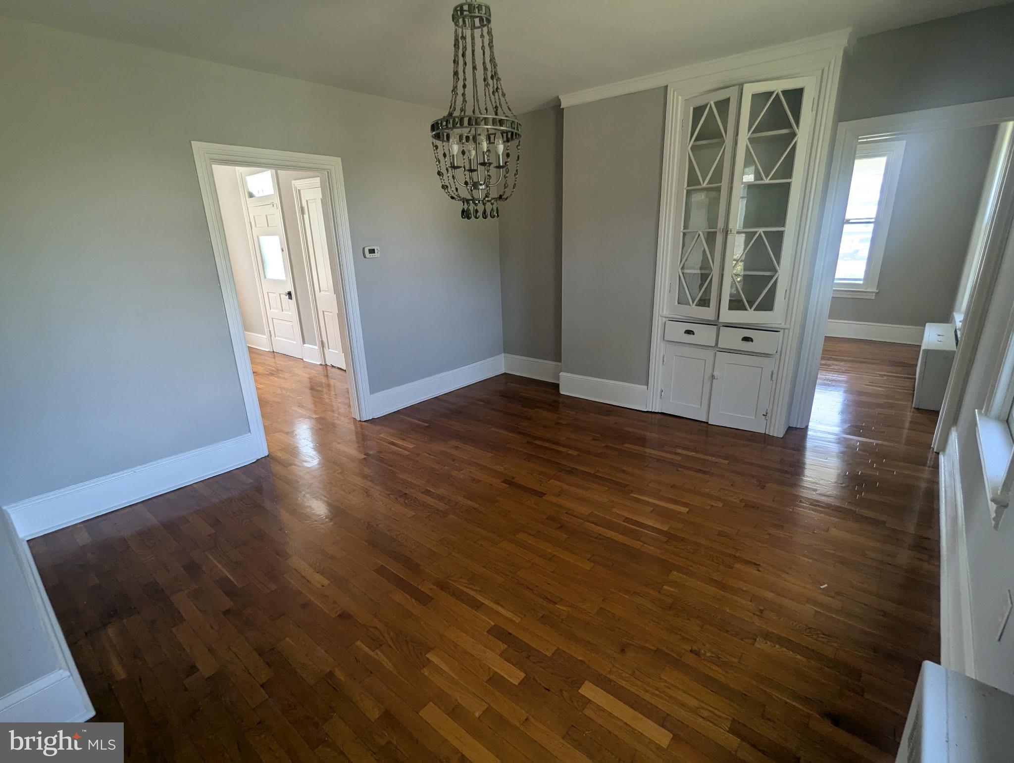 801 East Moler Avenue Martinsburg, WV 25404 - Photo 12 of 19 a view of a hallway with wooden floor and stairs
