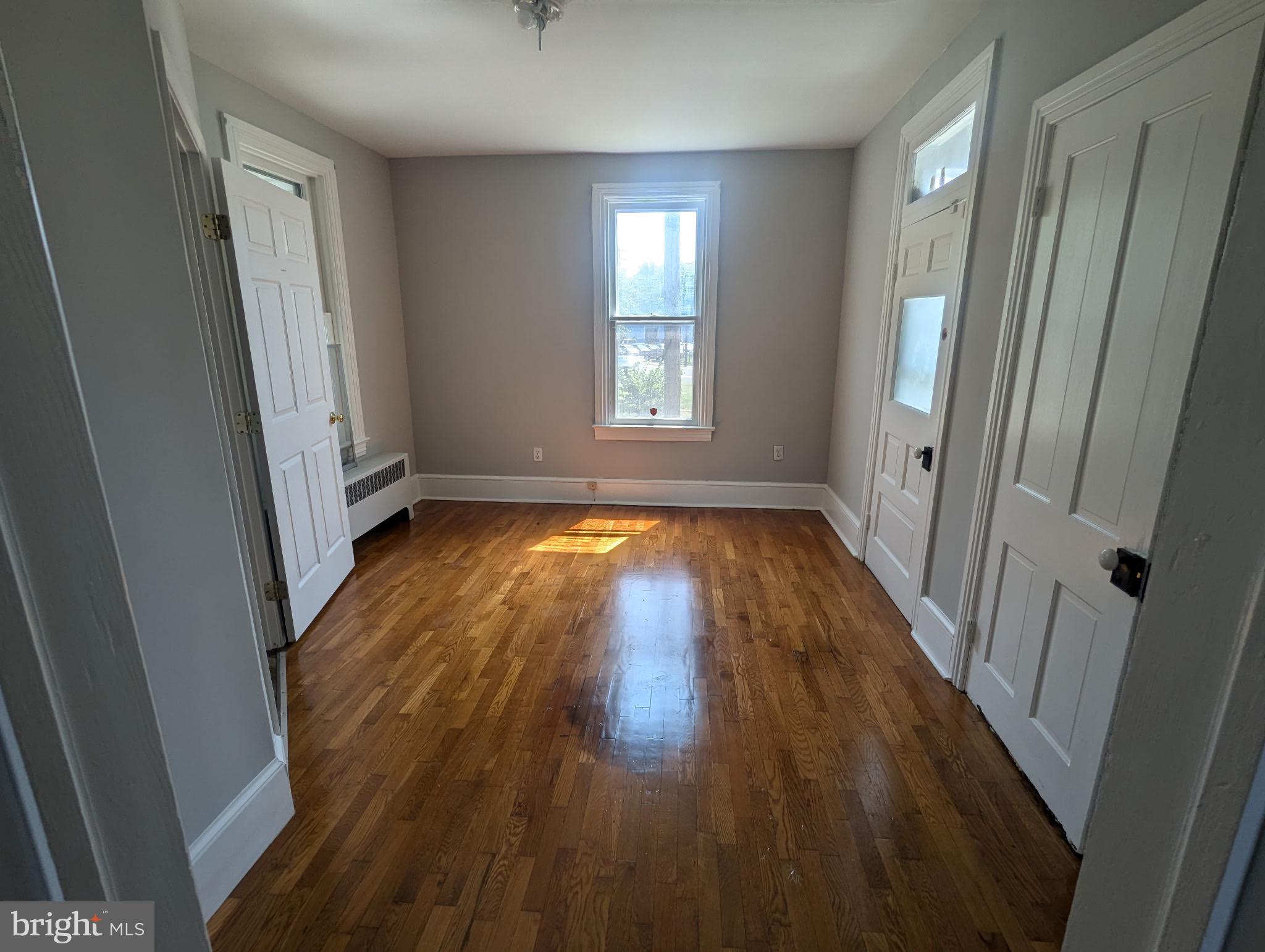 801 East Moler Avenue Martinsburg, WV 25404 - Photo 13 of 19 wooden floor in a room next to a window