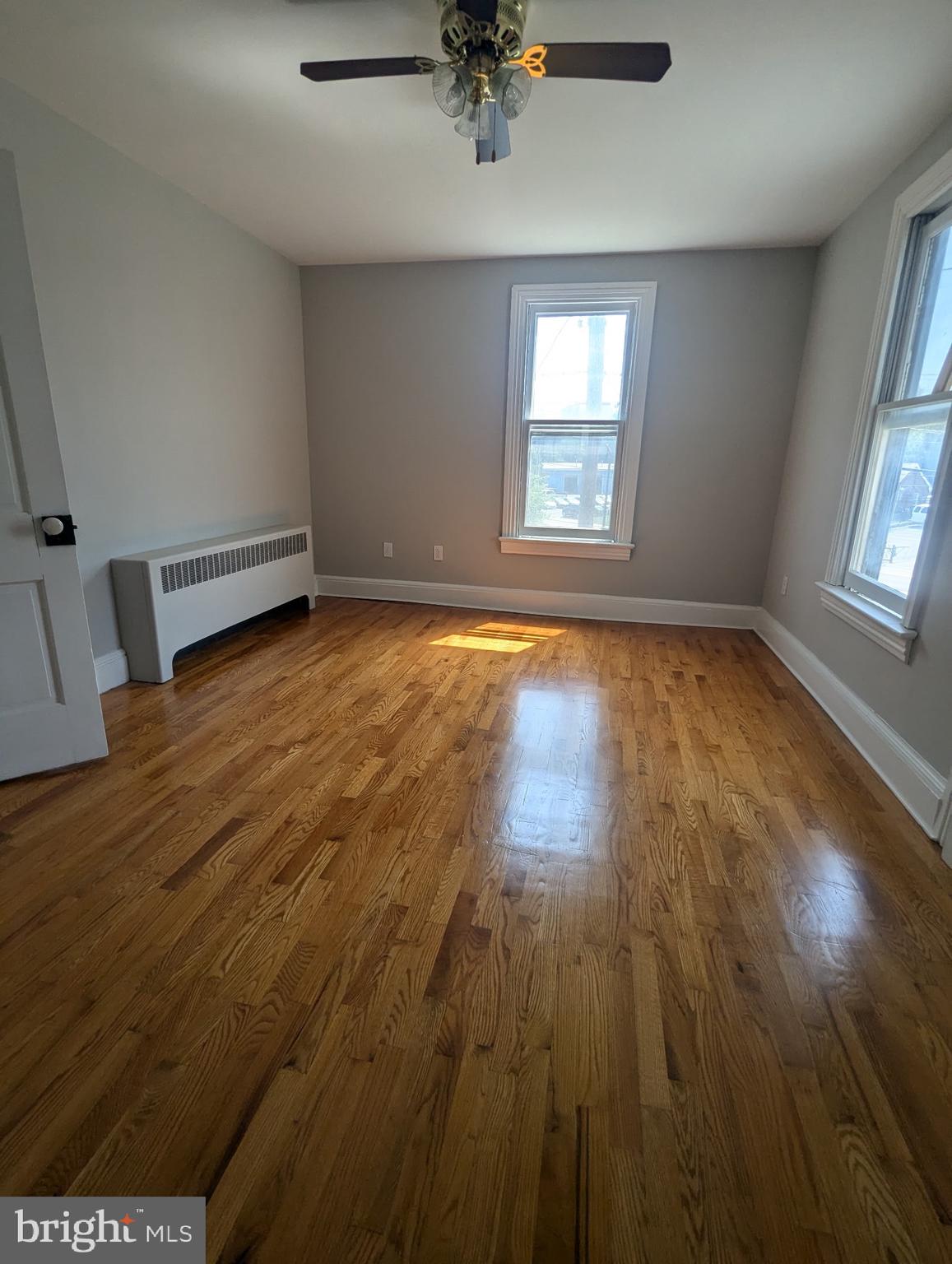 801 East Moler Avenue Martinsburg, WV 25404 - Photo 18 of 19 wooden floor in an empty room with a window