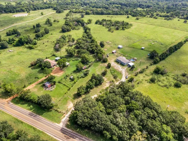 a view of a lake with a yard