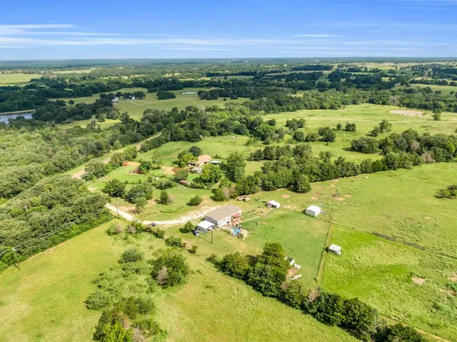 a view of a yard with an outdoor space