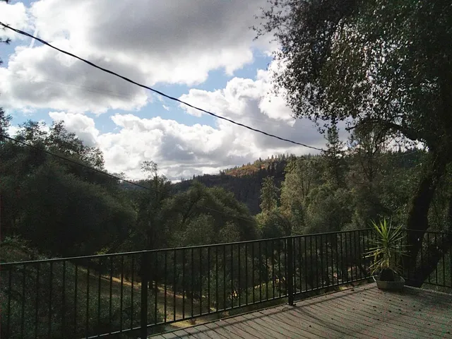 a balcony with wooden floor