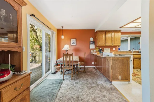 a view of a livingroom with furniture and window