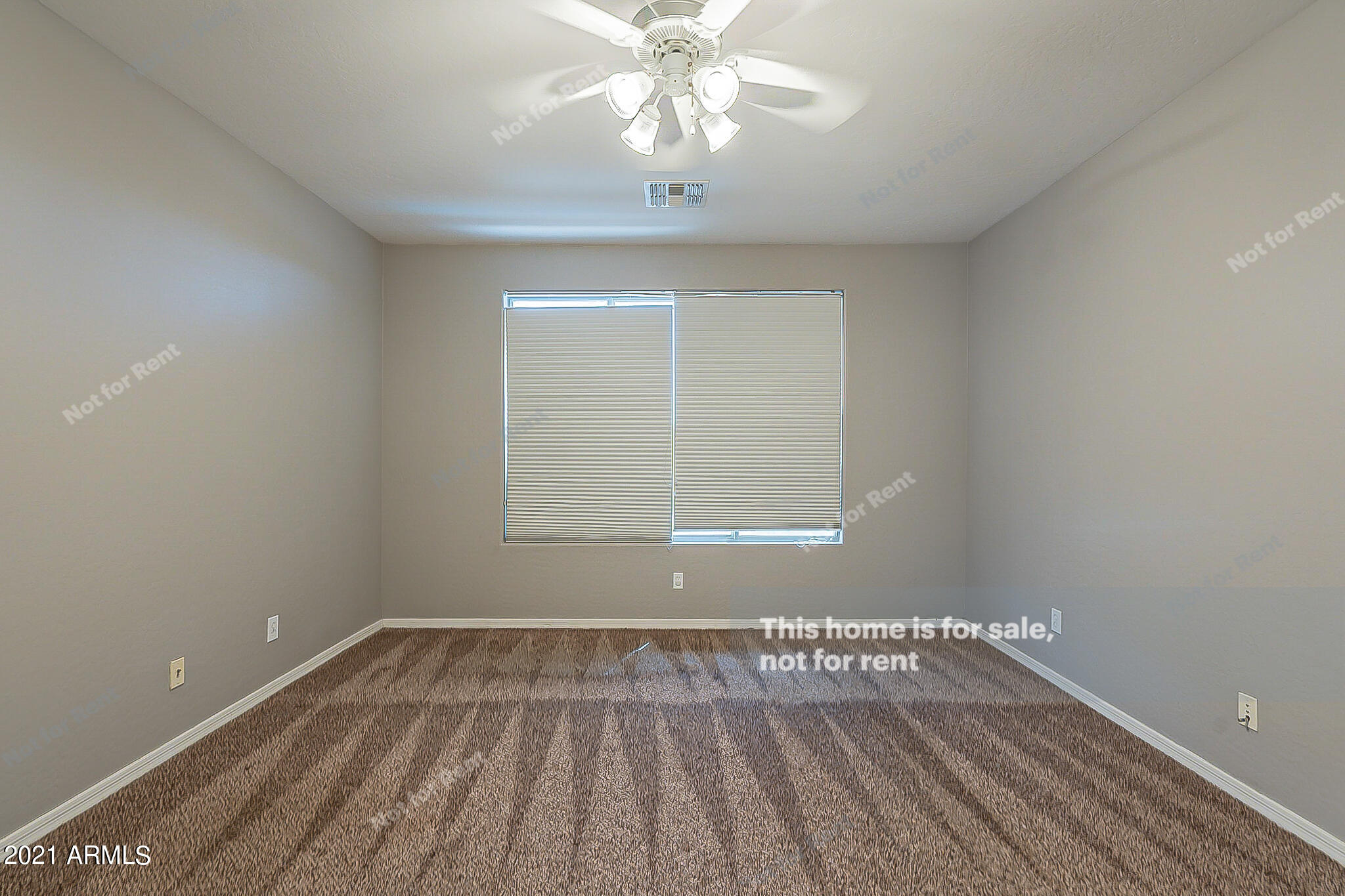 4639 East Timberline Road Gilbert, AZ 85297 - Photo 19 of 33 wooden floor in an empty room with a window