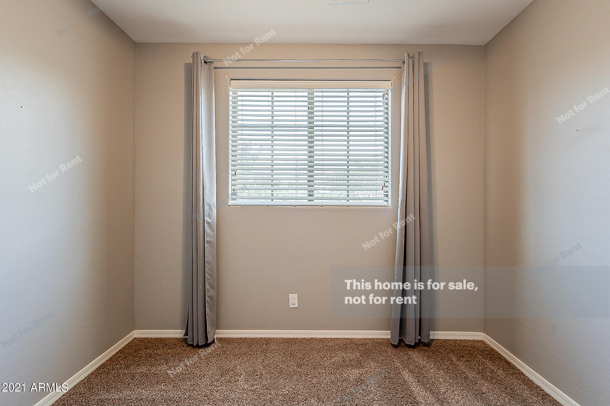 4639 East Timberline Road Gilbert, AZ 85297 - Photo 23 of 33 a view of an empty room with a window