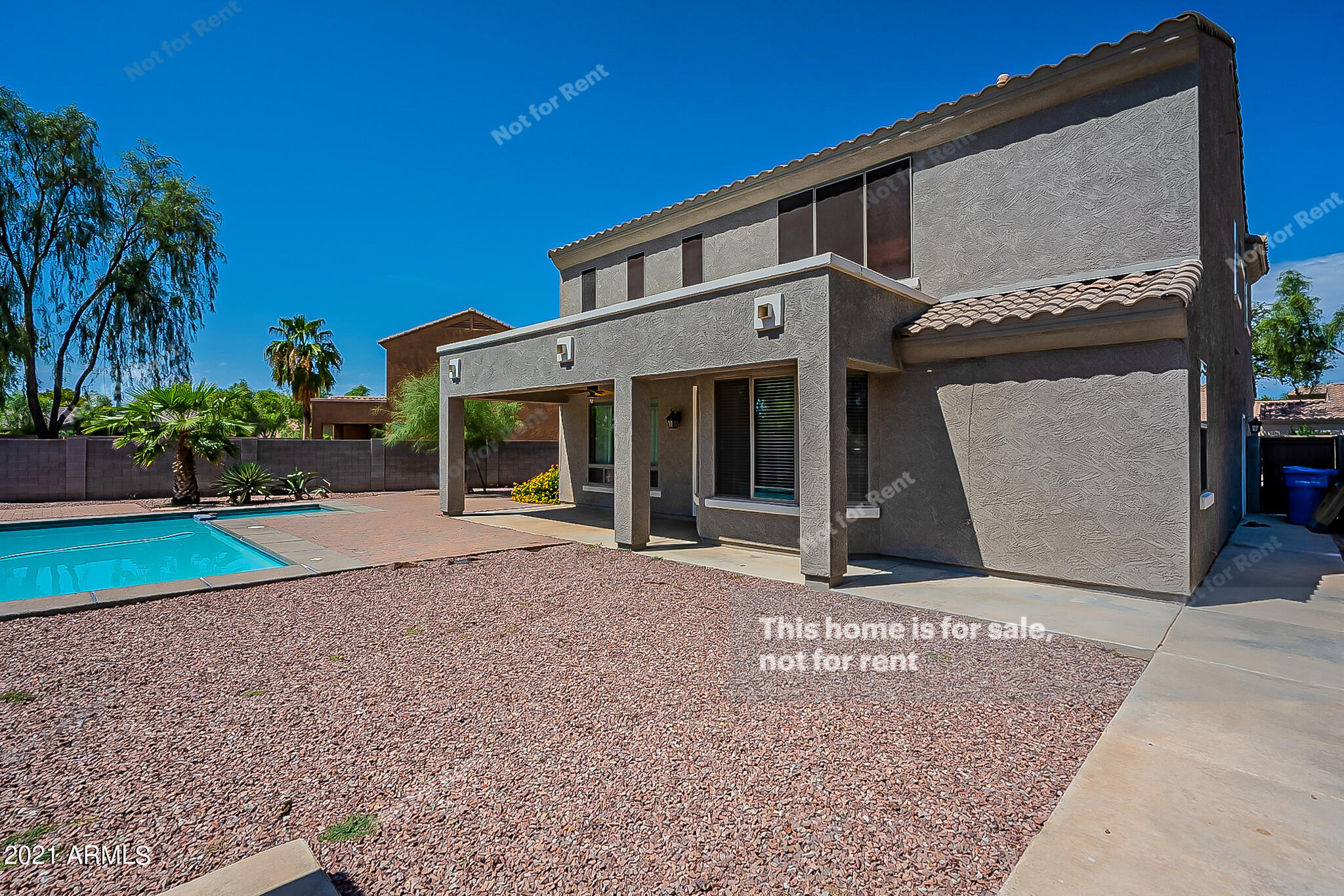 4639 East Timberline Road Gilbert, AZ 85297 - Photo 32 of 33 a front view of a house with garden