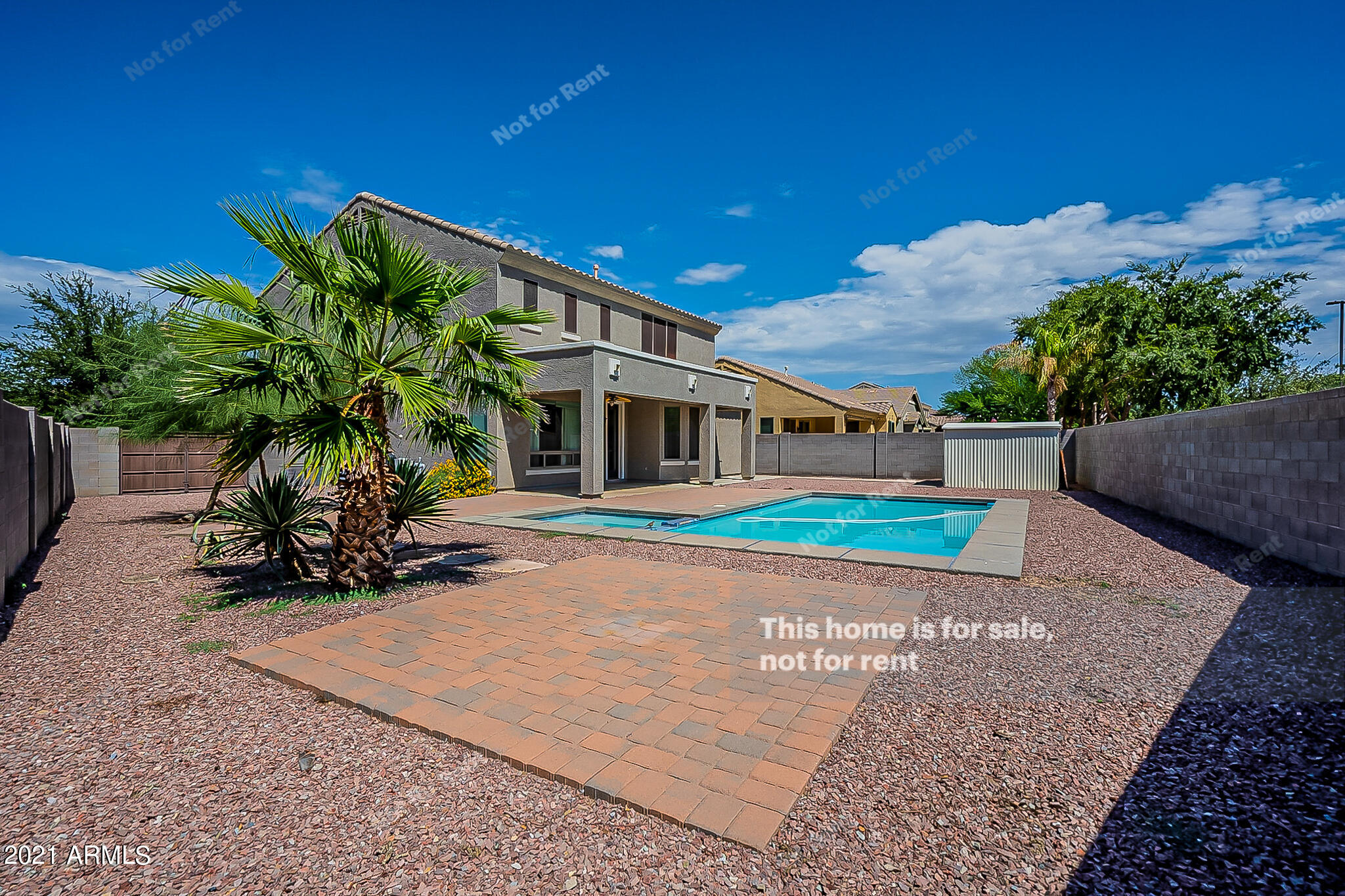 4639 East Timberline Road Gilbert, AZ 85297 - Photo 7 of 33 a house with lots of trees in the background