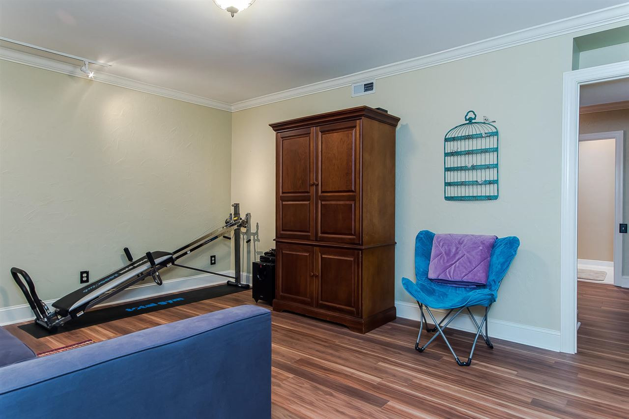 820 Tadlock Drive Raleigh, NC 27614 - Photo 19 of 25 Rec Room is in the basement with pergo flooring Rec Room