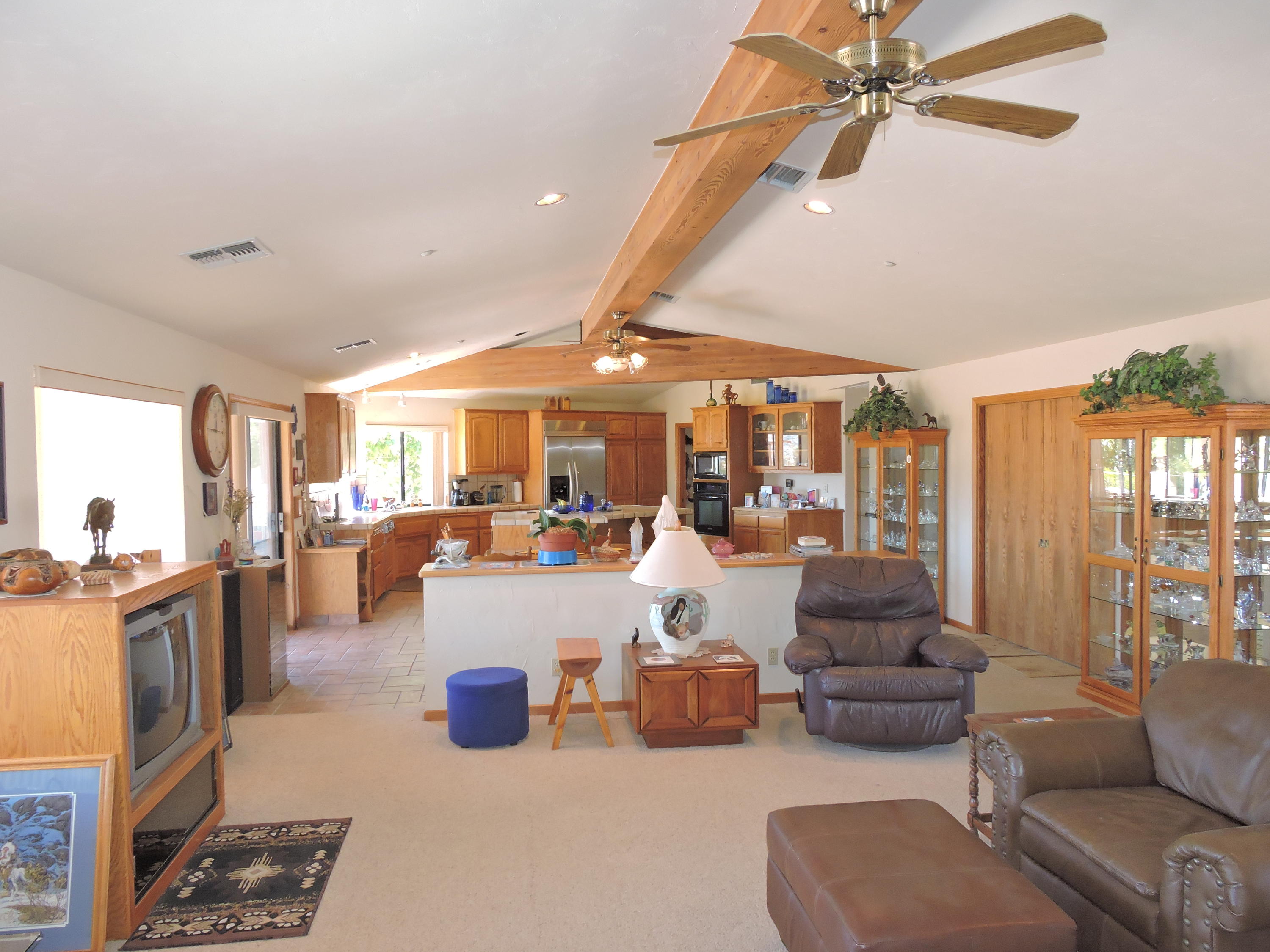 63533 Wagon Wheel Road Joshua Tree, CA 92252 - Photo 14 of 62 a living room with furniture and a large window