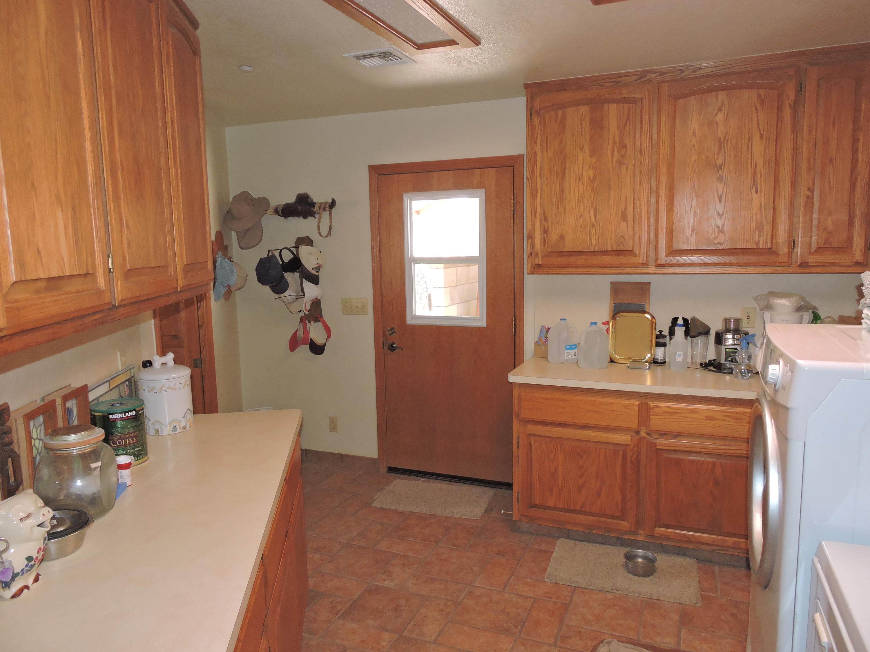 63533 Wagon Wheel Road Joshua Tree, CA 92252 - Photo 23 of 62 a room with a window and a kitchen