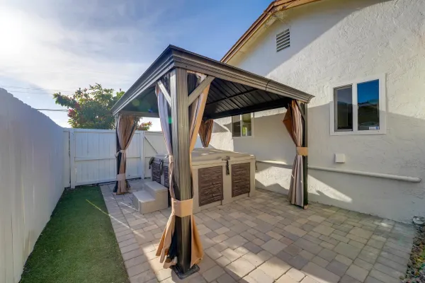 a house view with a backyard space