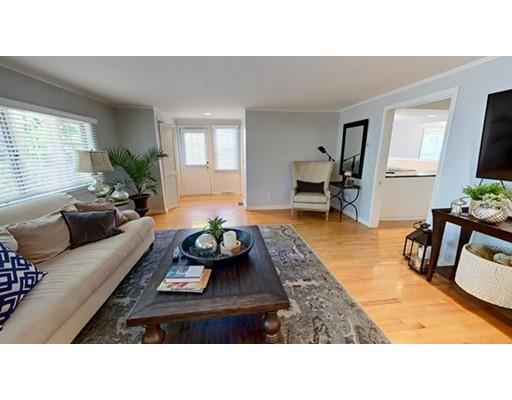 9 Stearns Road Wellesley, MA 02482 - Photo 3 of 13 a living room with furniture and a flat screen tv