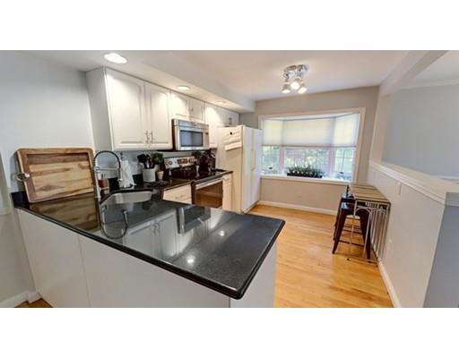 9 Stearns Road Wellesley, MA 02482 - Photo 4 of 13 a kitchen with sink refrigerator and large window