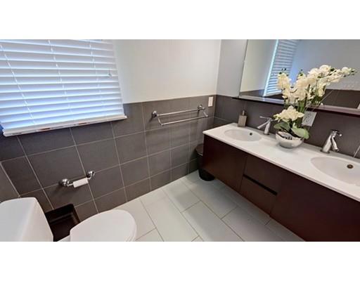 9 Stearns Road Wellesley, MA 02482 - Photo 8 of 13 a bathroom with a sink and a mirror