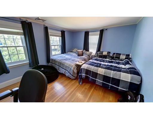 9 Stearns Road Wellesley, MA 02482 - Photo 10 of 13 a living room with bed and a window
