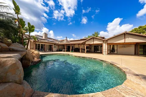 a view of outdoor space yard and swimming pool