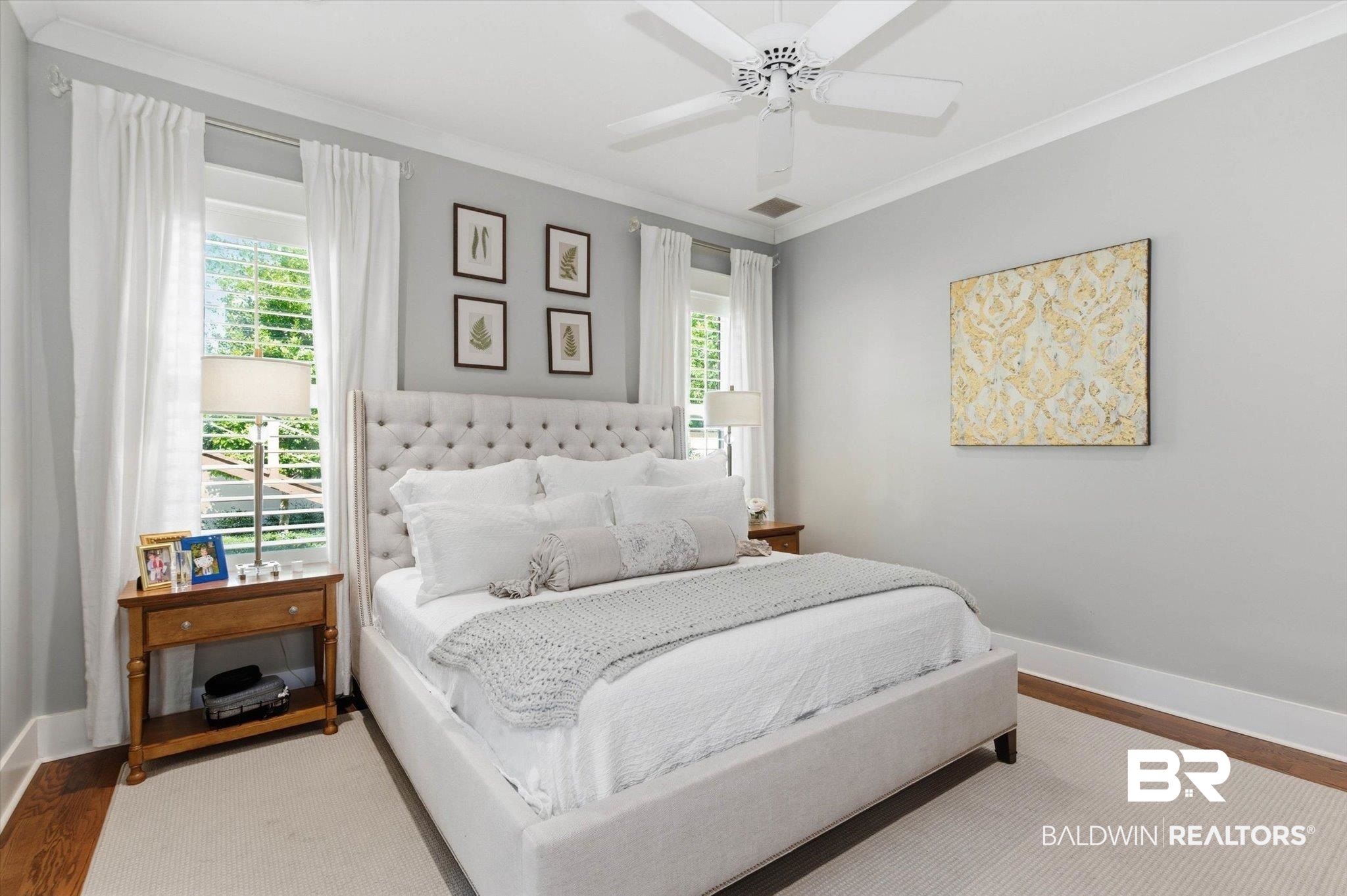 3704 Stein Street Mobile, AL 36608 - Photo 13 of 37 Bedroom featuring wood finished floors, crown molding, and a ceiling fan