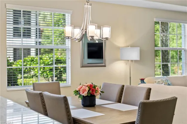 a bedroom with a bed a desk and chair