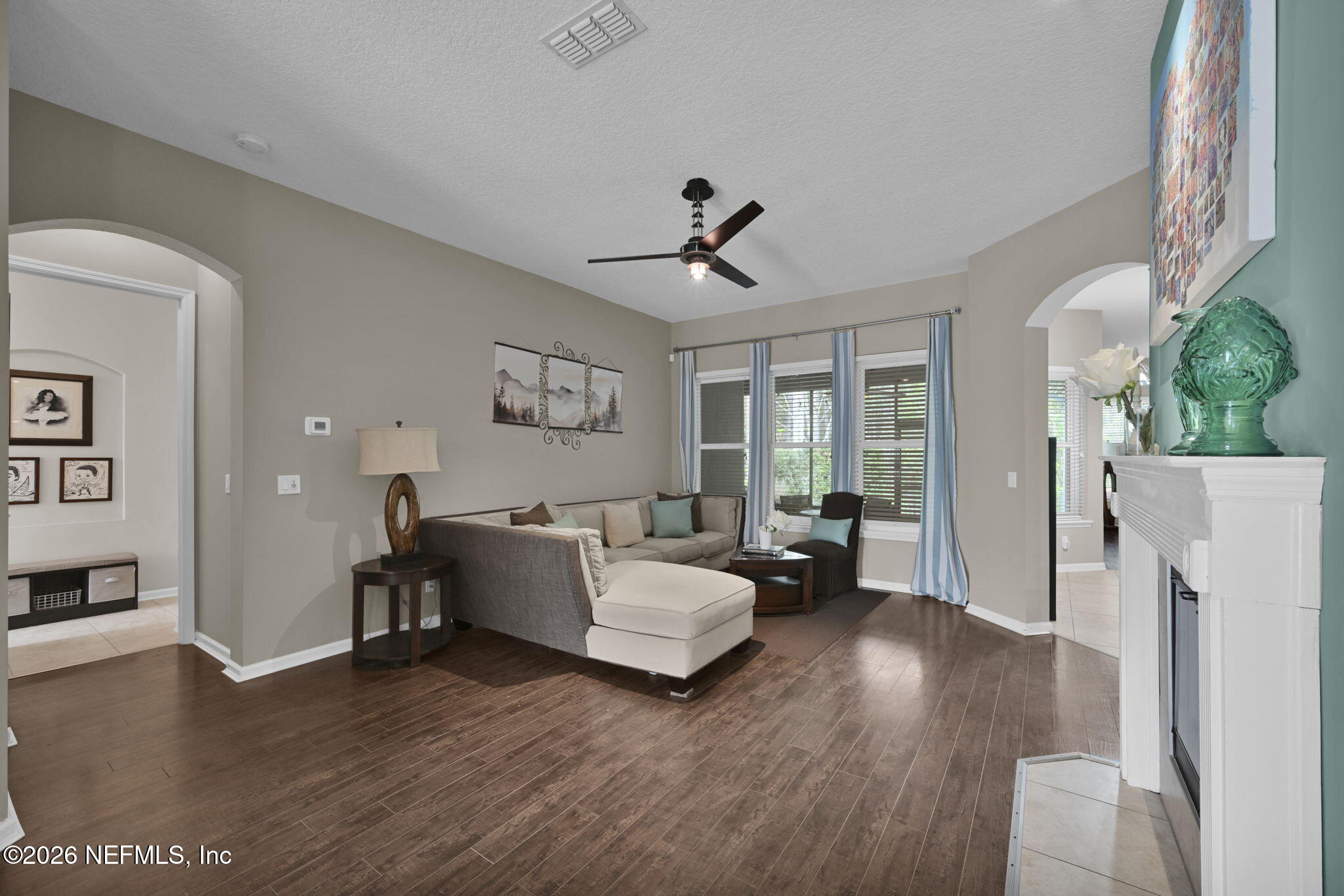 6191 White Tip Road Jacksonville, FL 32258 - Photo 12 of 58 a living room with furniture and a large window