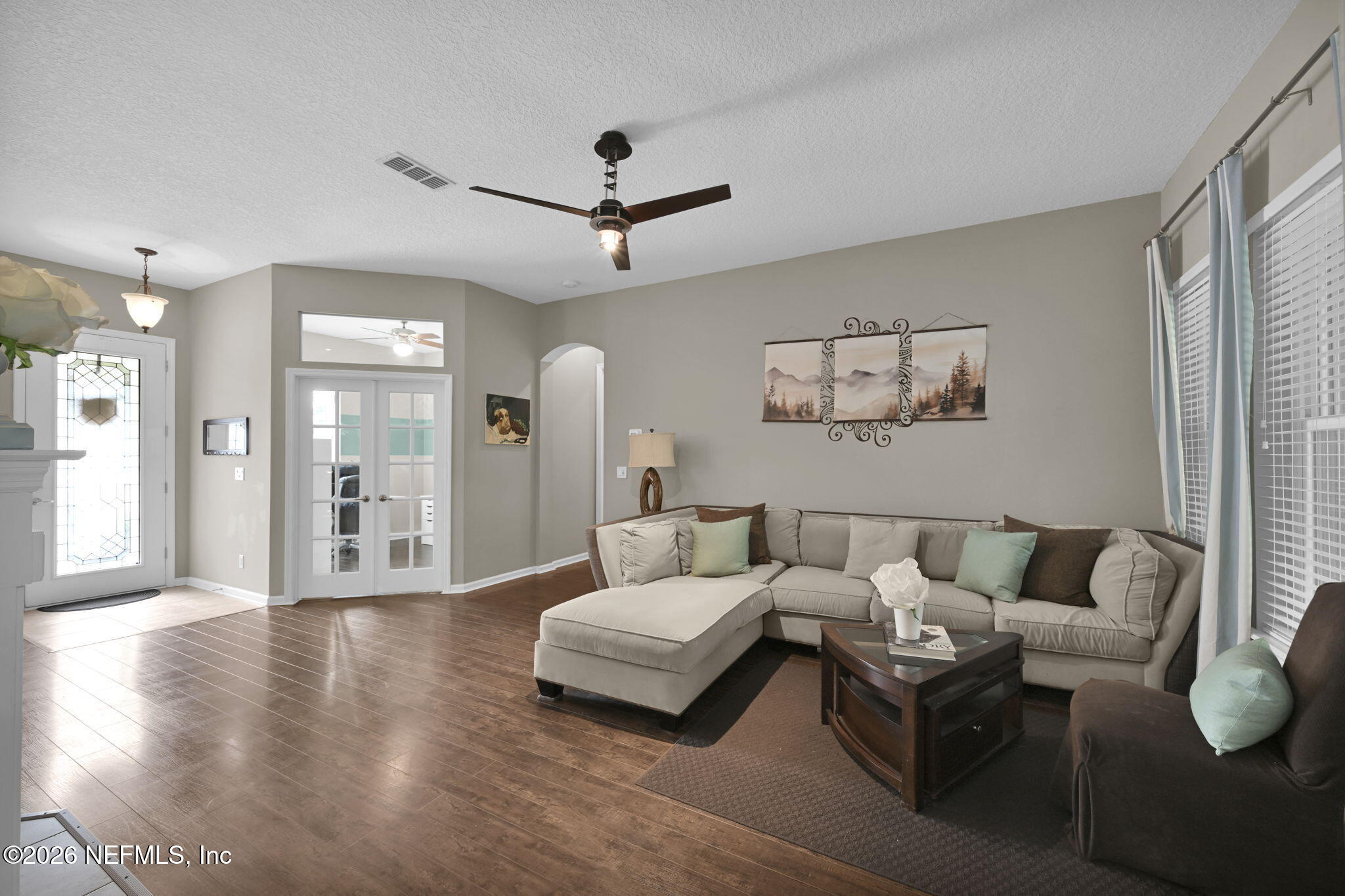 6191 White Tip Road Jacksonville, FL 32258 - Photo 14 of 58 a living room with furniture and wooden floor