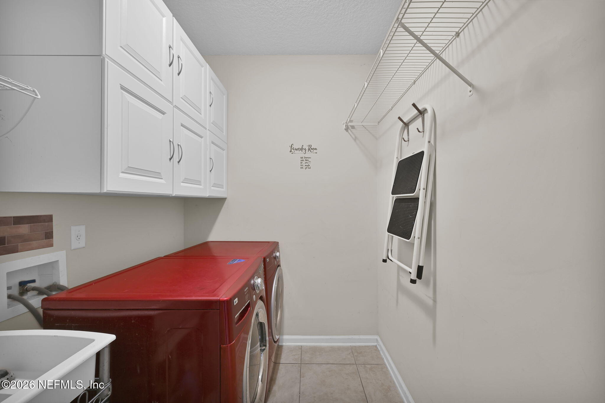 6191 White Tip Road Jacksonville, FL 32258 - Photo 32 of 58 a utility room with dryer and washer