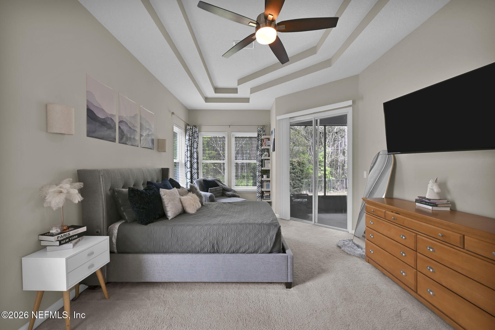 6191 White Tip Road Jacksonville, FL 32258 - Photo 33 of 58 a bedroom with a bed and large window