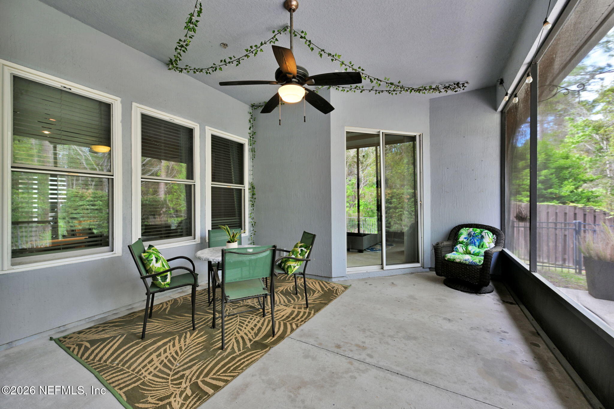 6191 White Tip Road Jacksonville, FL 32258 - Photo 42 of 58 a dining room with furniture garden view and a chandelier