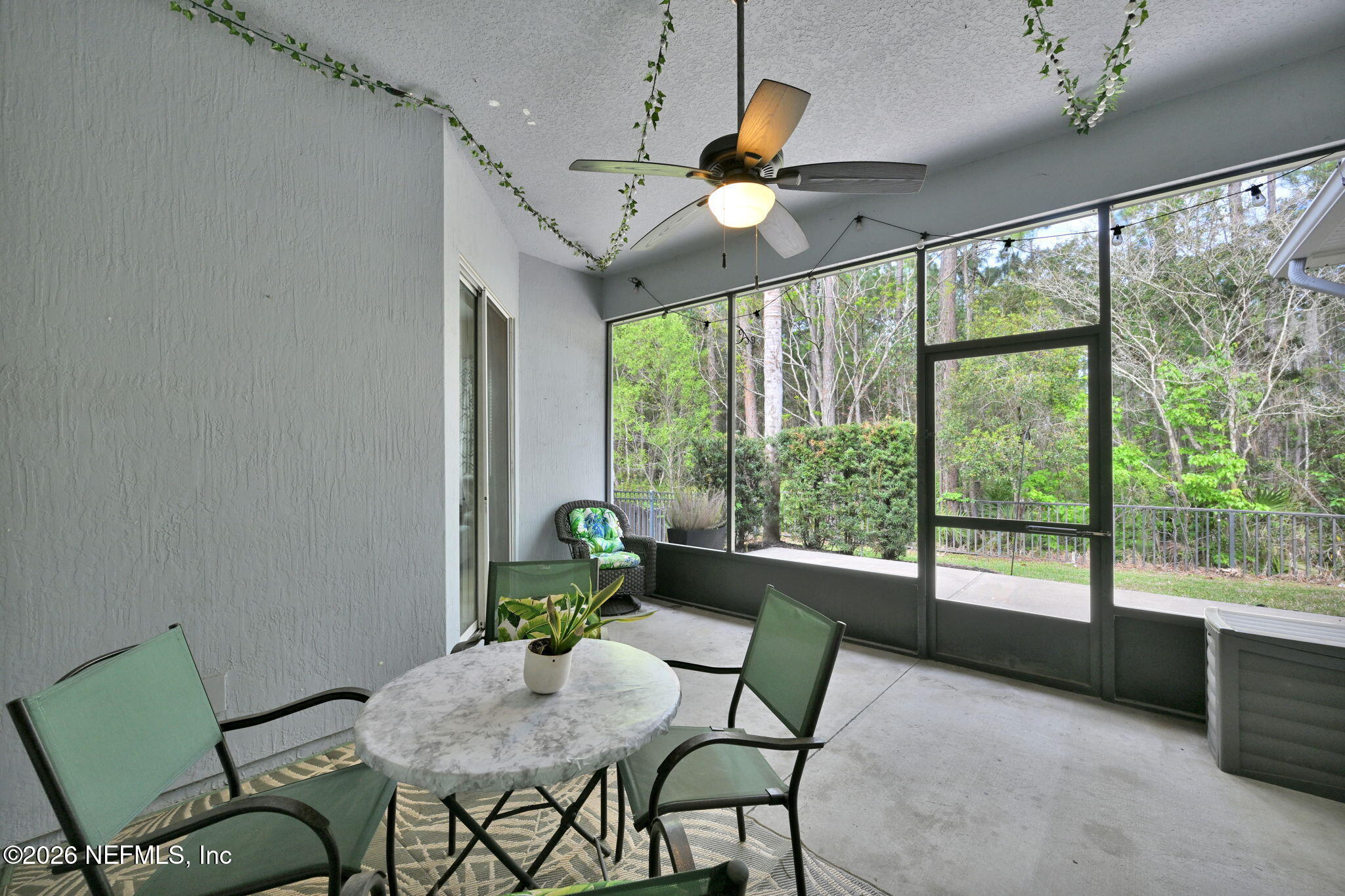 6191 White Tip Road Jacksonville, FL 32258 - Photo 43 of 58 a living room with furniture and a large window