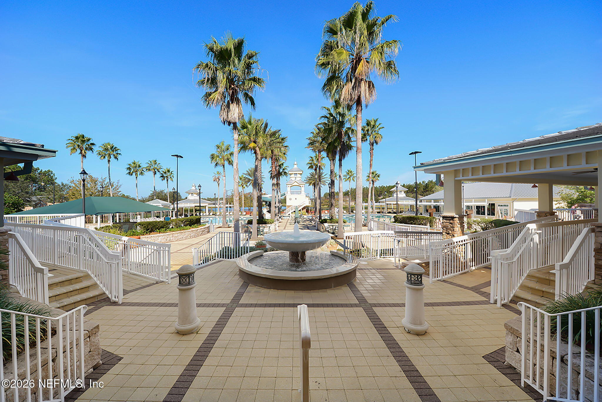 6191 White Tip Road Jacksonville, FL 32258 - Photo 51 of 58 a view of a swimming pool with outdoor seating and plants
