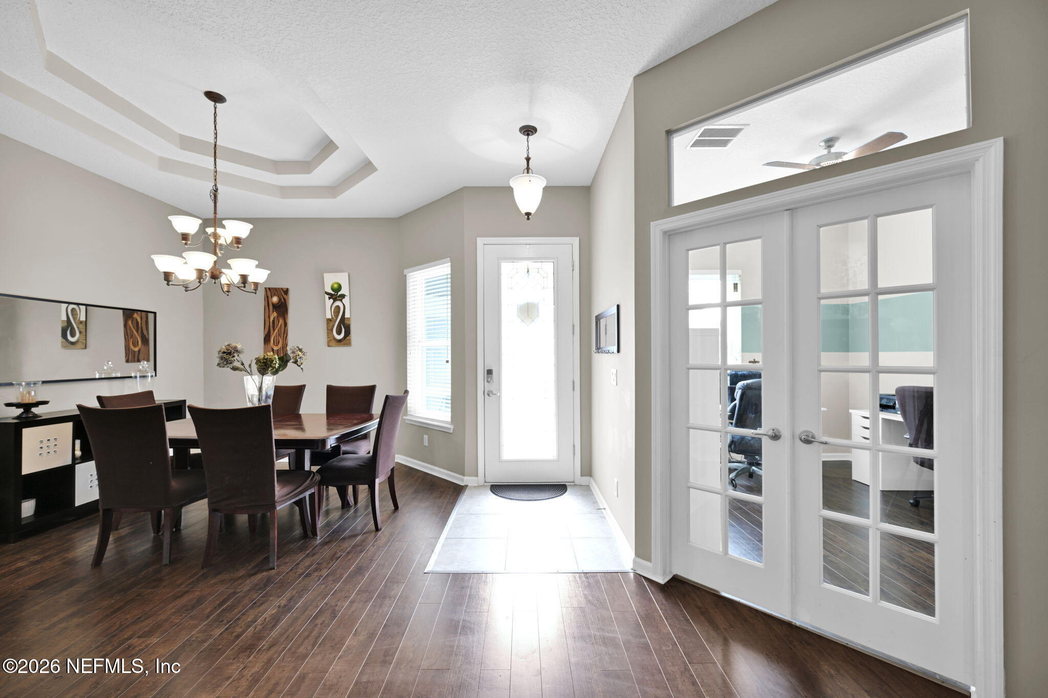 6191 White Tip Road Jacksonville, FL 32258 - Photo 6 of 58 a view of a dining room with furniture window and wooden floor