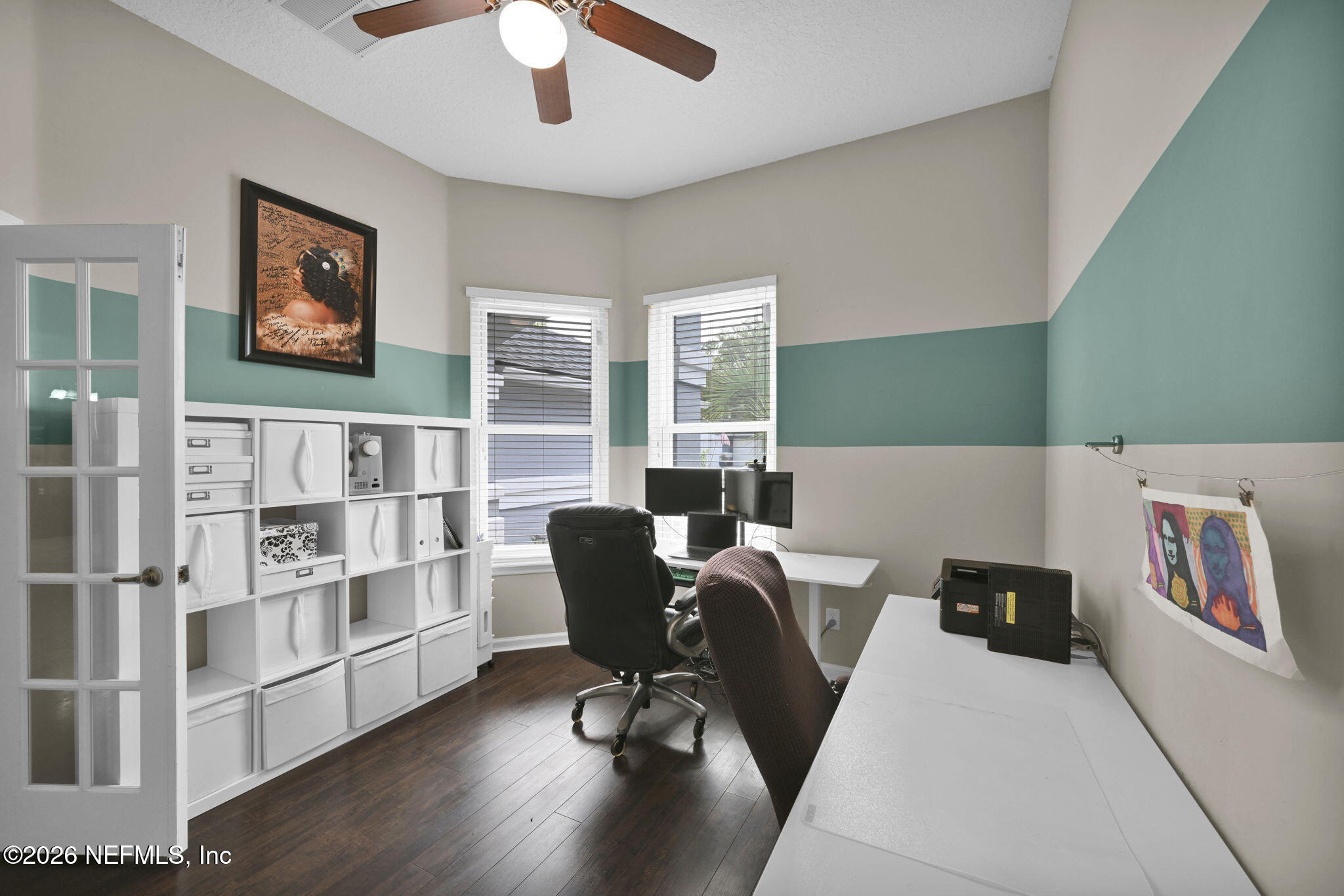 6191 White Tip Road Jacksonville, FL 32258 - Photo 8 of 58 a living room with furniture and a book shelf