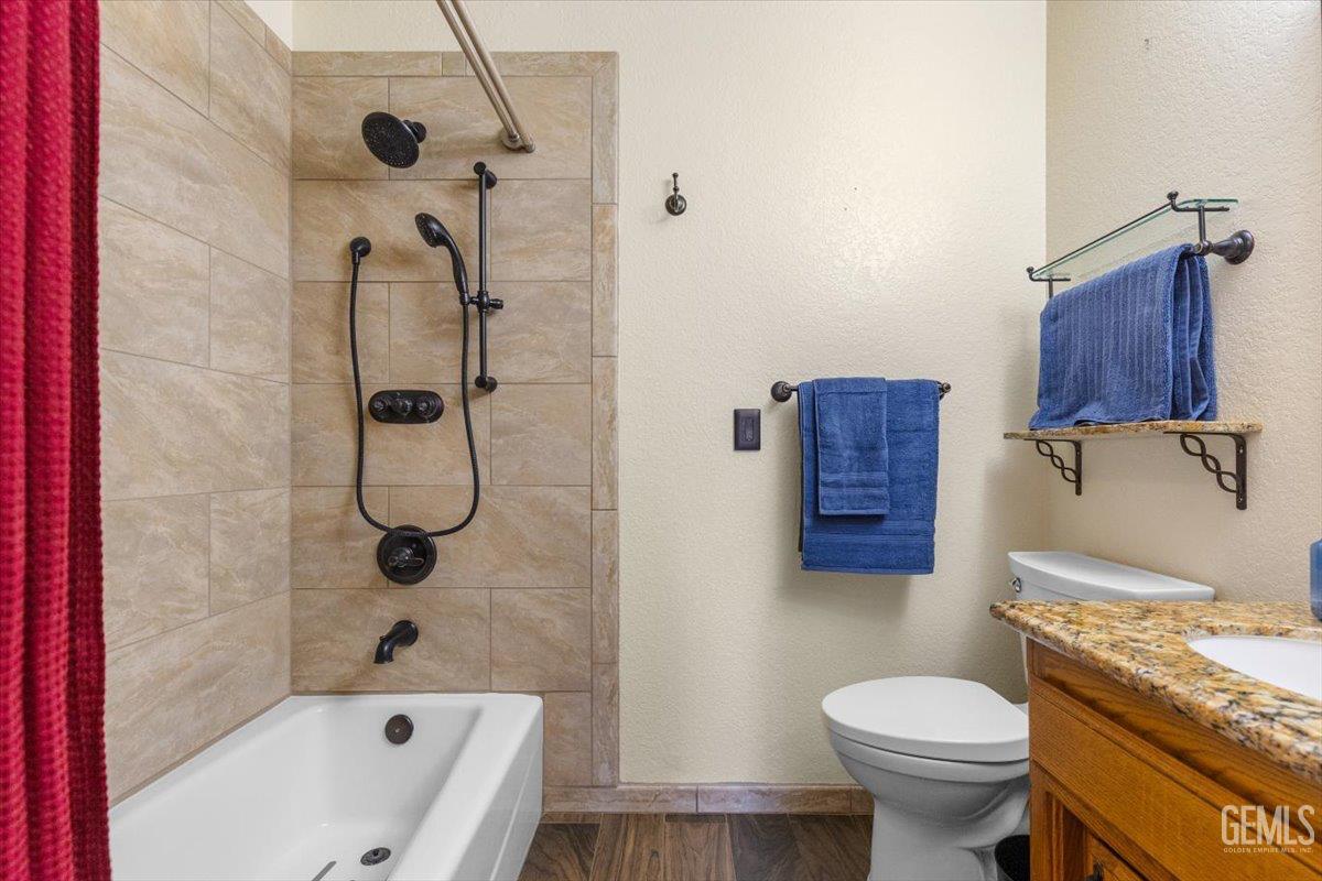 Undisclosed Address Tehachapi, CA 93561 - Photo 15 of 46 a bathroom with a sink toilet and shower