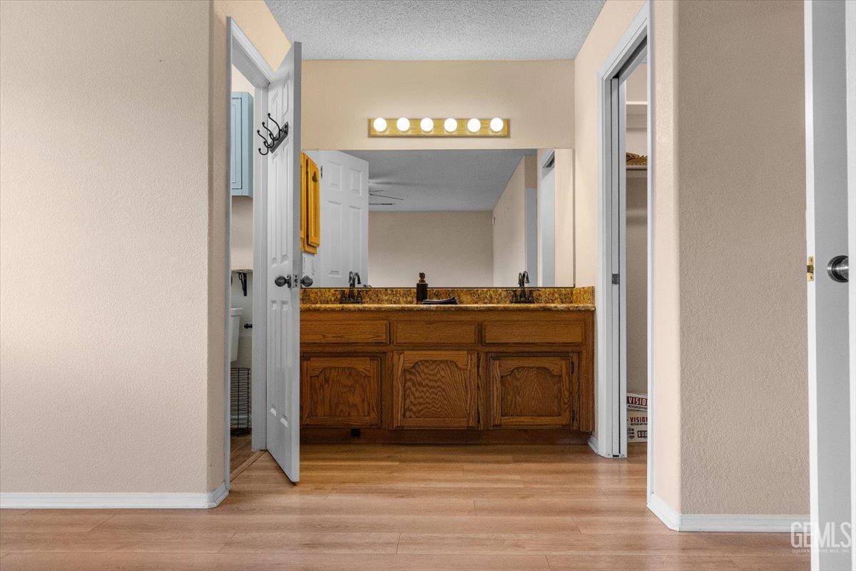 Undisclosed Address Tehachapi, CA 93561 - Photo 27 of 46 a bathroom with a sink and a mirror