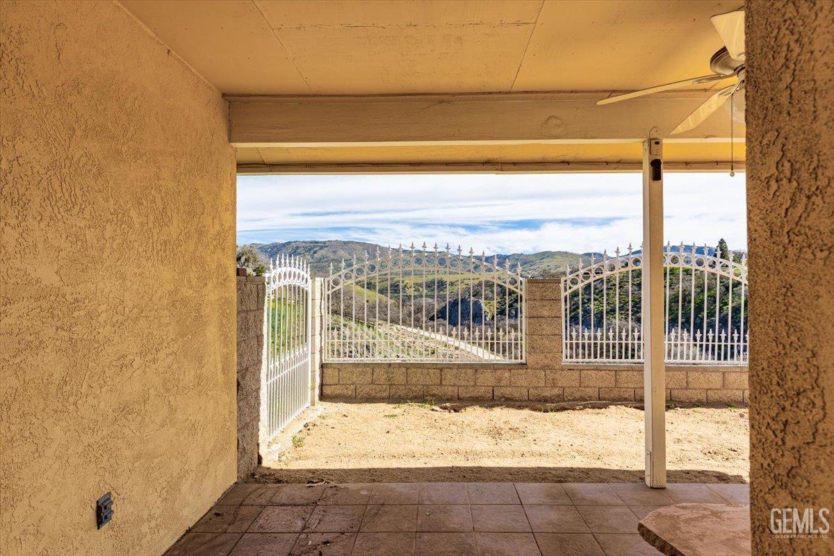 Undisclosed Address Tehachapi, CA 93561 - Photo 30 of 46 a view of a balcony with a floor to ceiling window wooden floor