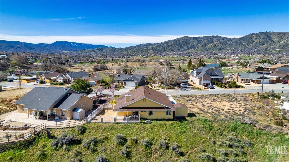 Undisclosed Address Tehachapi, CA 93561 - Photo 3 of 46 an aerial view of residential houses with outdoor space and trees