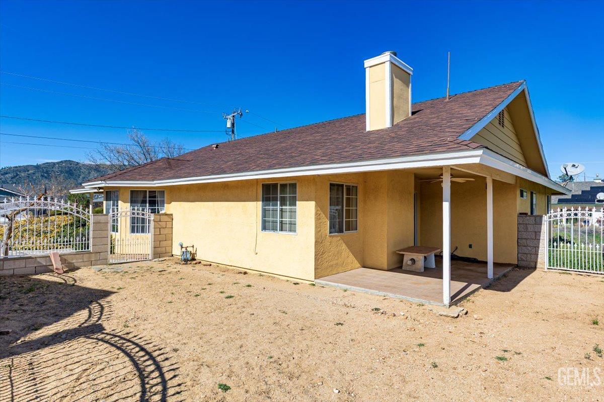 Undisclosed Address Tehachapi, CA 93561 - Photo 34 of 46 a front view of a house with a yard