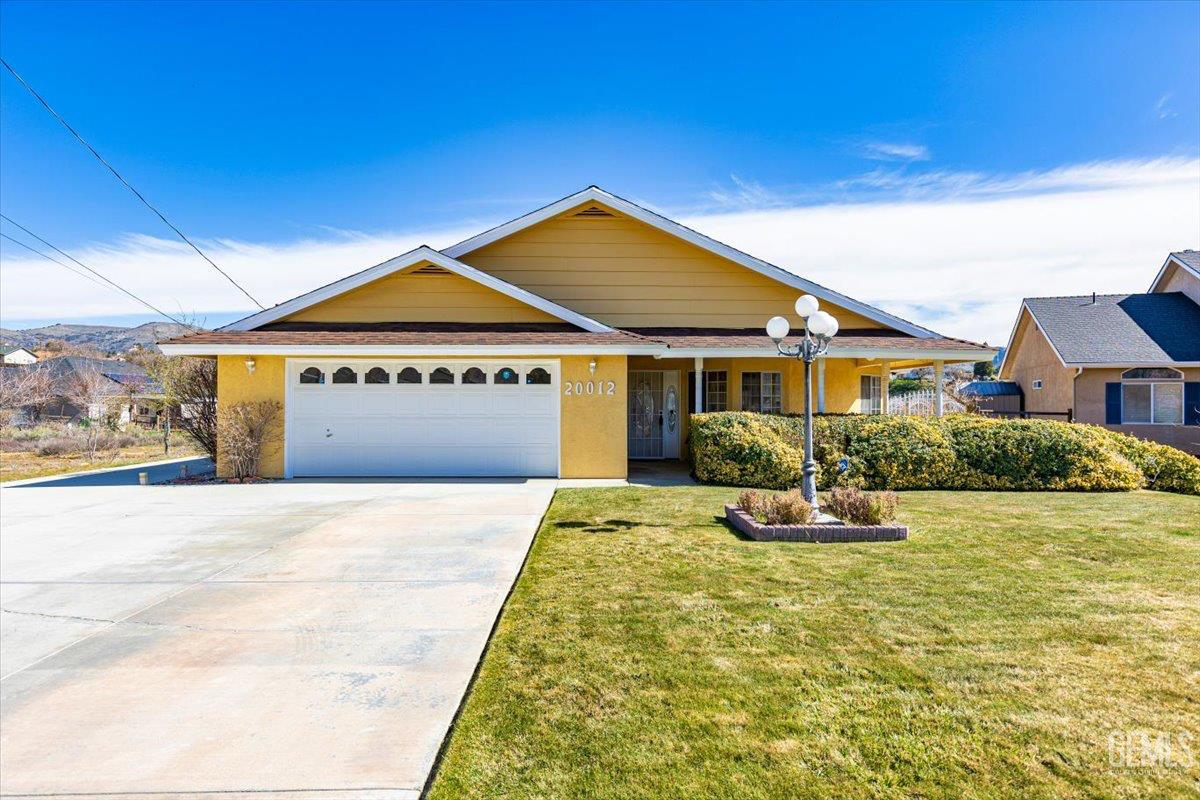 Undisclosed Address Tehachapi, CA 93561 - Photo 38 of 46 a front view of a house with a yard