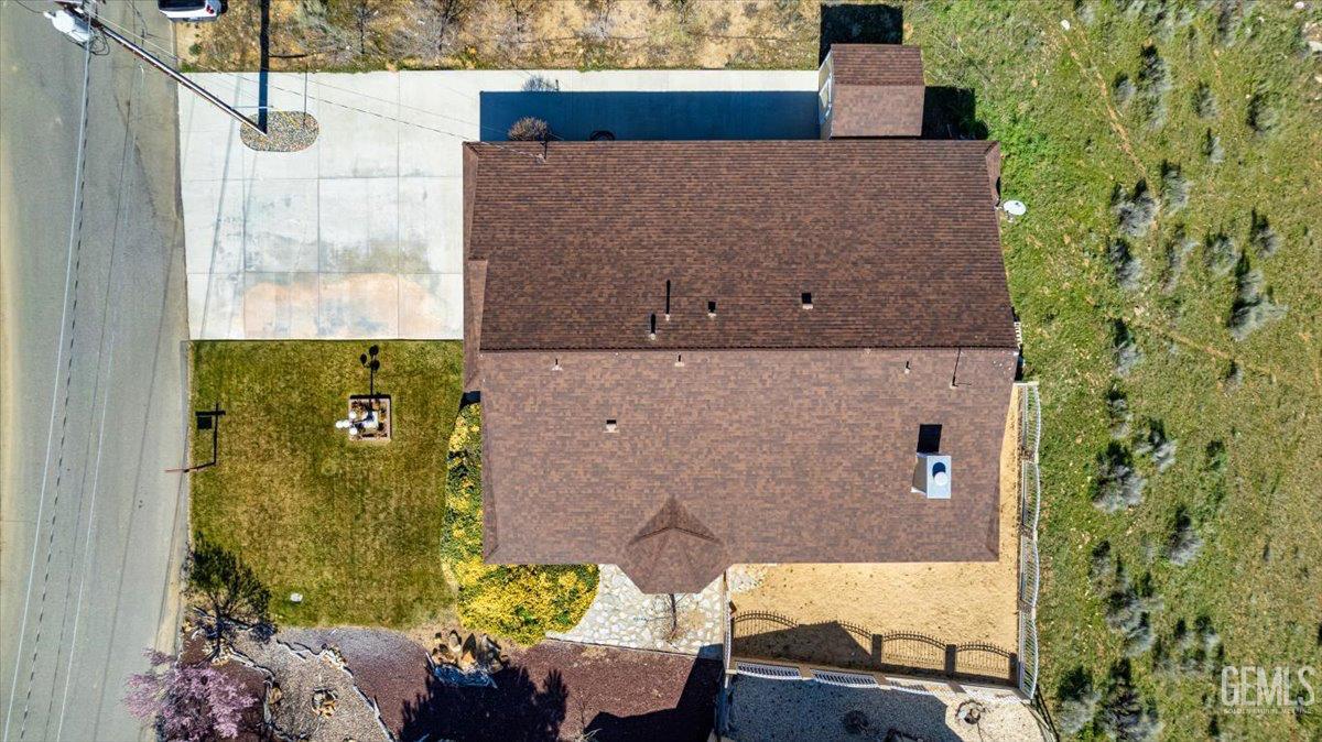 Undisclosed Address Tehachapi, CA 93561 - Photo 41 of 46 aerial view of a house with a yard