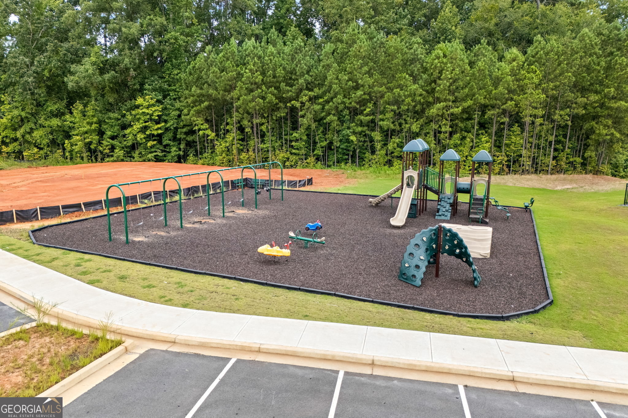 117 Shenandoah Lane, Unit 22D LaGrange, GA 30241 - Photo 17 of 20 a view of a swimming pool with a yard