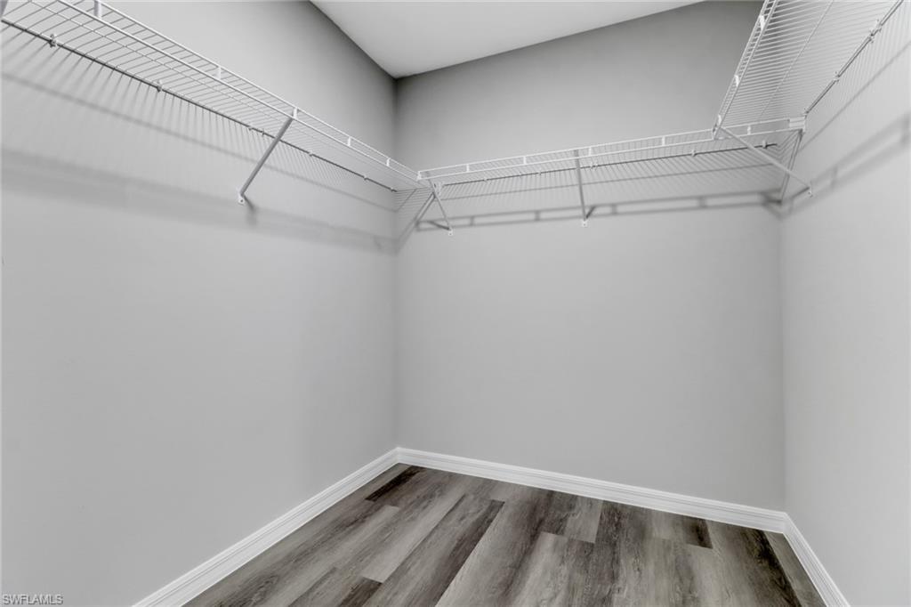 1012 Anza Avenue Lehigh Acres, FL 33971 - Photo 16 of 25 a view of a room with racks on the wall