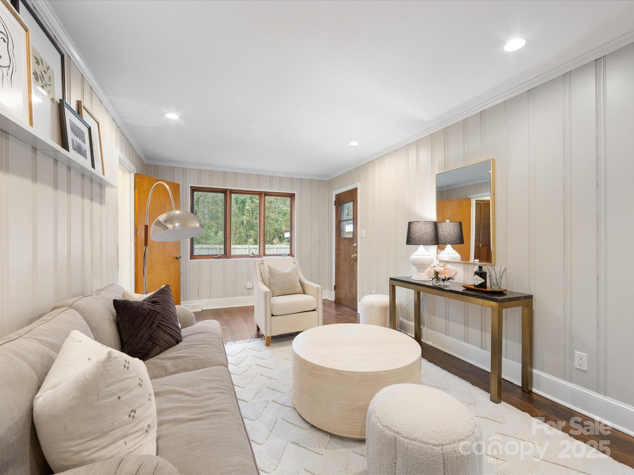 2908 Enfield Road Charlotte, NC 28205 - Photo 13 of 32 a living room with furniture and a flat screen tv