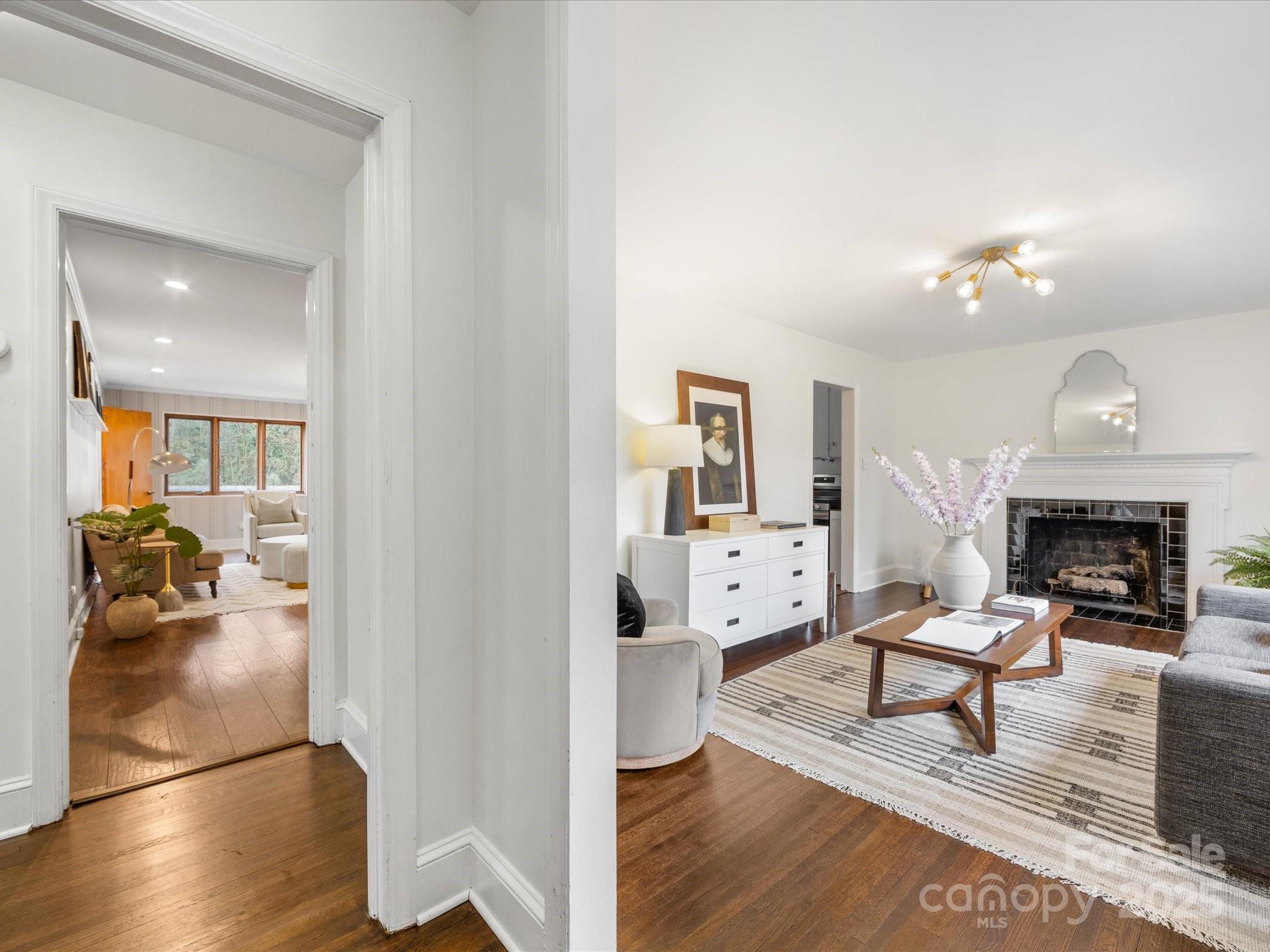 2908 Enfield Road Charlotte, NC 28205 - Photo 18 of 32 a living room with furniture and a fireplace