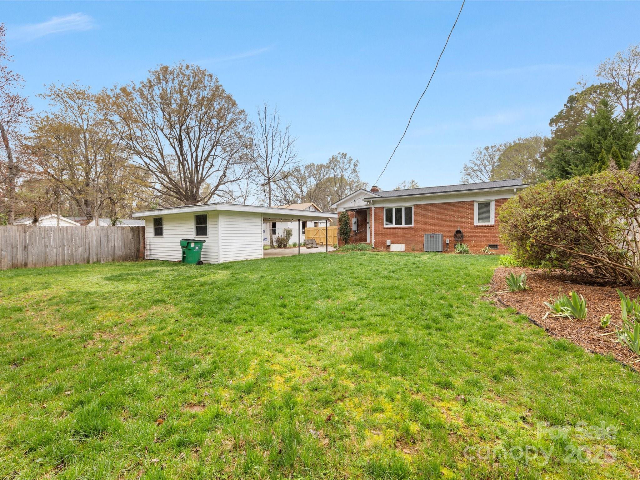 2908 Enfield Road Charlotte, NC 28205 - Photo 31 of 32 a front view of house with a garden
