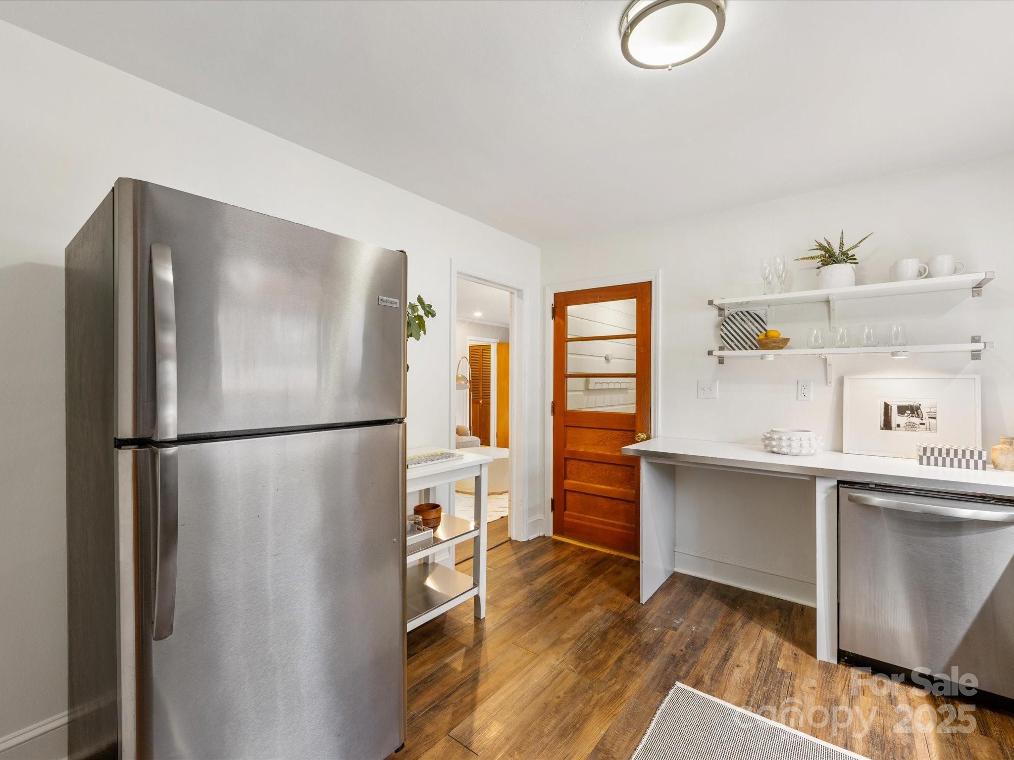 2908 Enfield Road Charlotte, NC 28205 - Photo 10 of 32 a white refrigerator freezer sitting inside of a kitchen