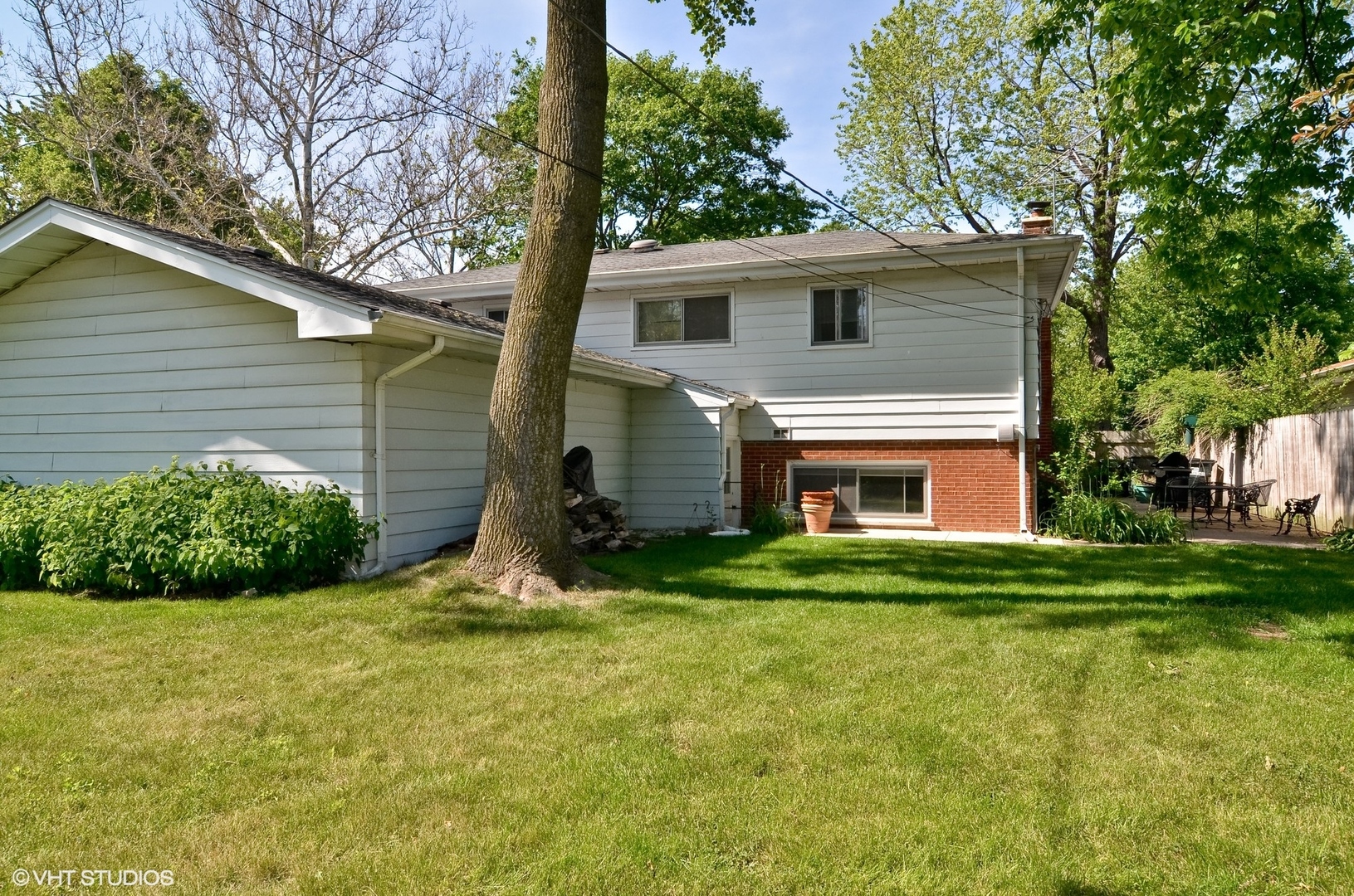 739 Echo Lane Glenview, IL 60025 - Photo 23 of 27 a view of a house with backyard and garden