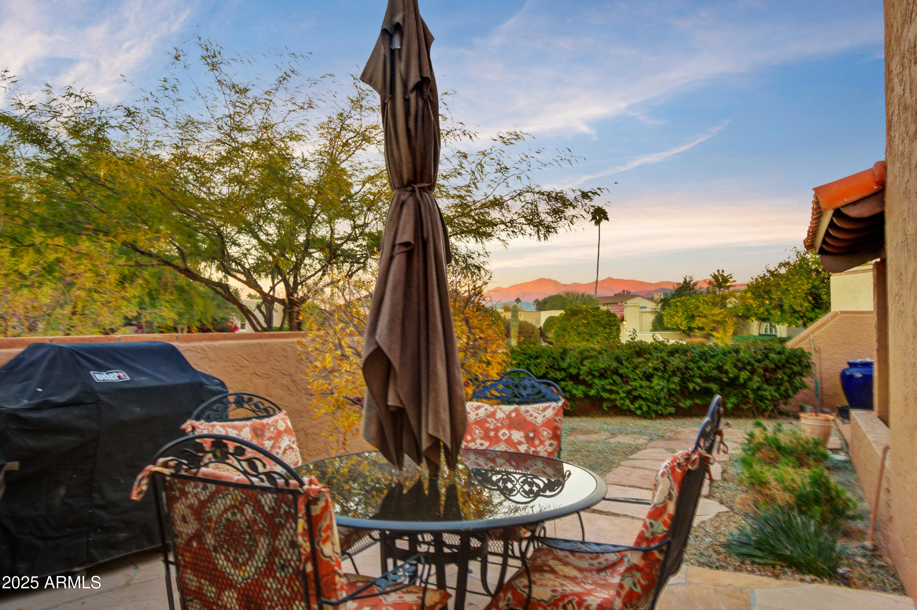 25828 North Primo Circle Rio Verde, AZ 85263 - Photo 15 of 21 a view of a chairs and table in patio