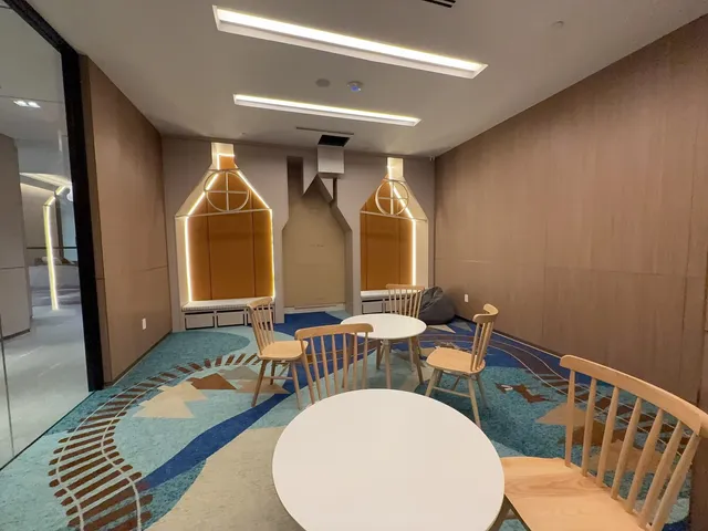 a very nice looking dining room with chairs