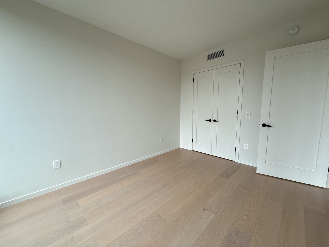 11-36 45th Road, Unit 403A Queens, NY 11101 - Photo 7 of 15 a view of an empty room